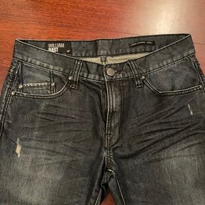 Men’s William Rast dark distressed jeans. Never worn.